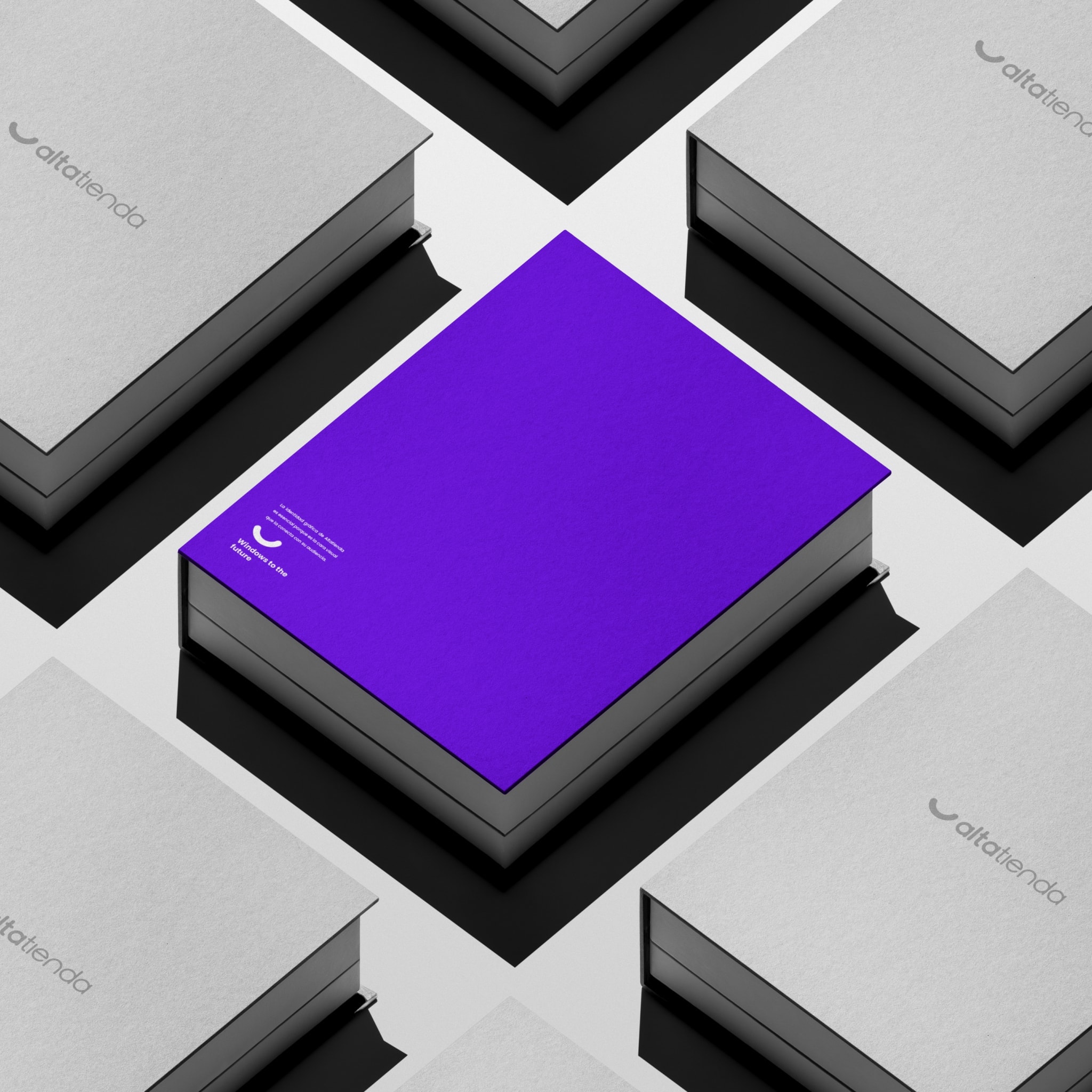 Stacks of brand books, the violet cover on top