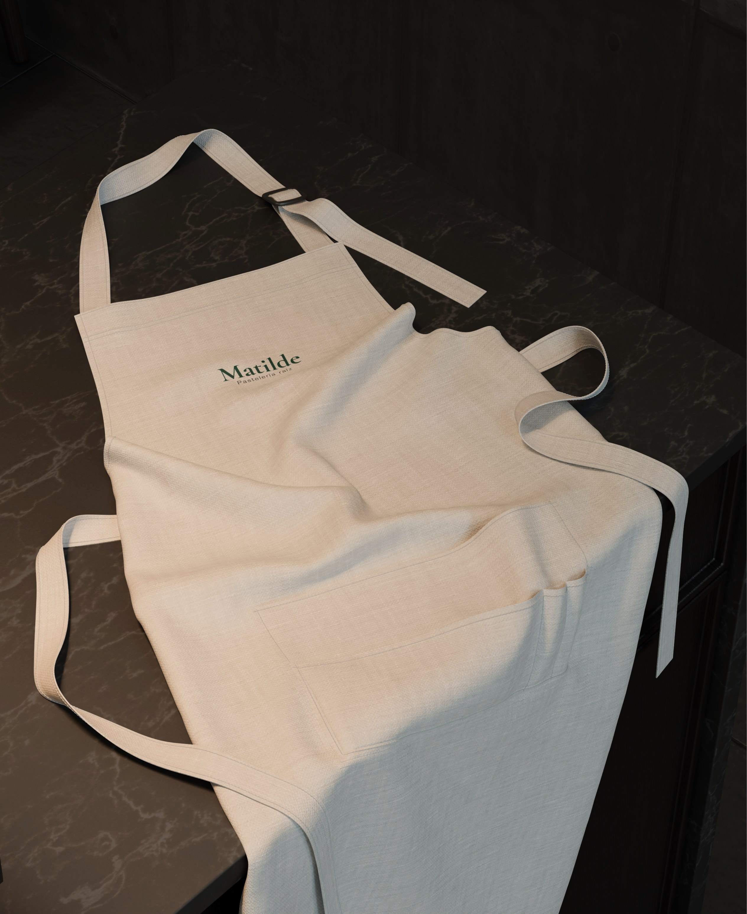 A branded apron hanging beside the machine