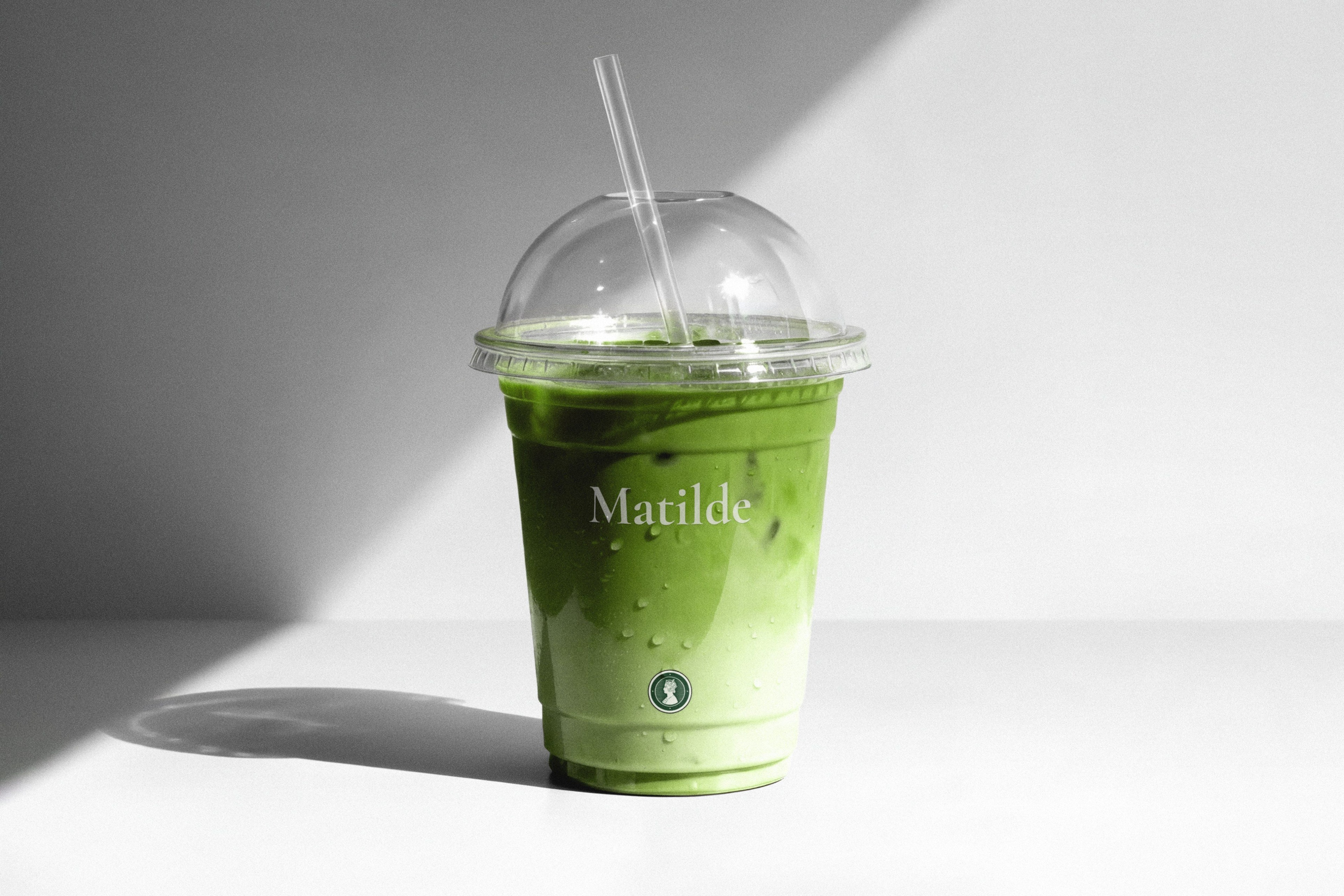 A matcha in a branded cup