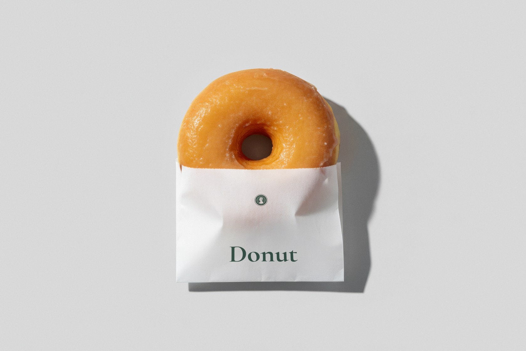 A donut in a branded sleeve