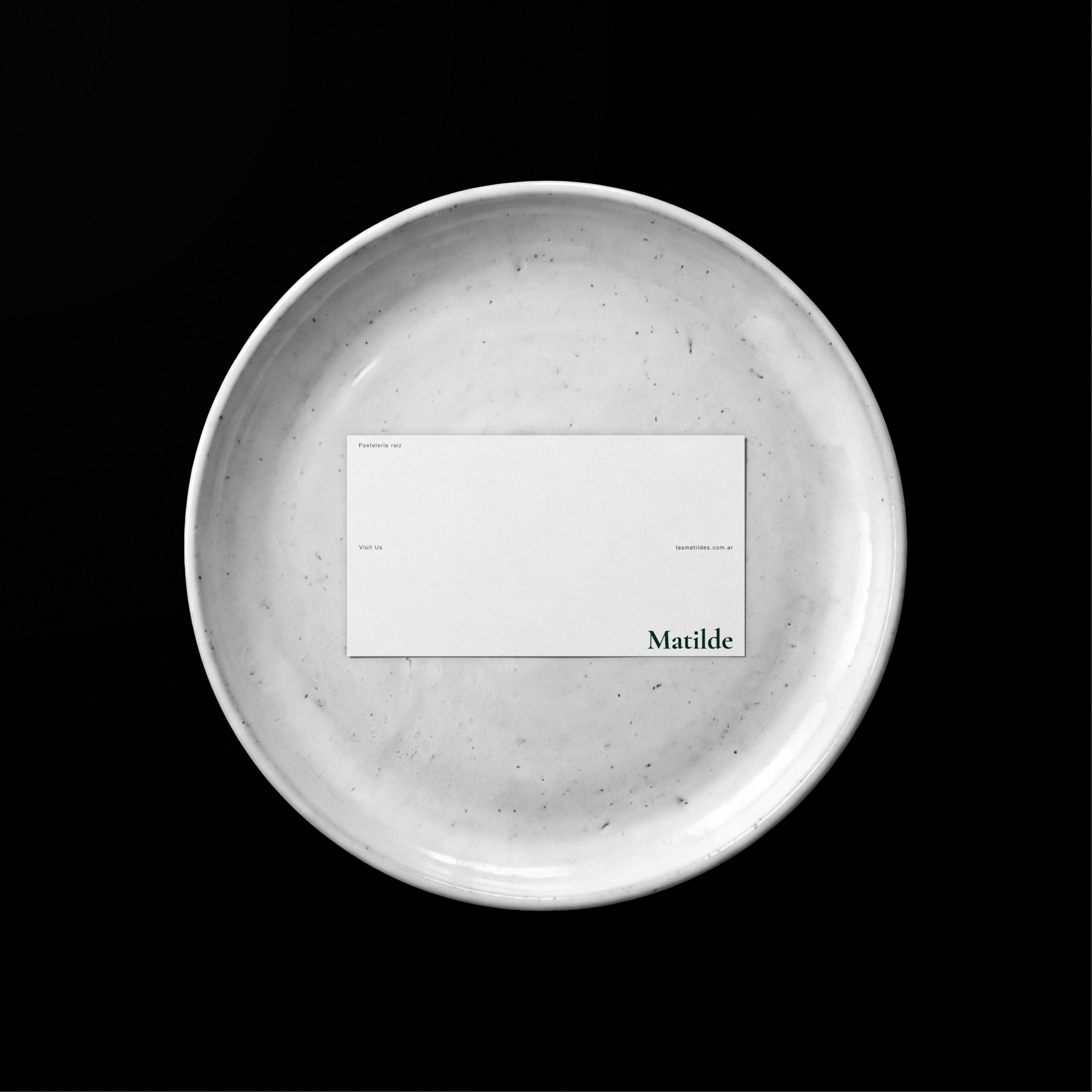 A card on a marble plate