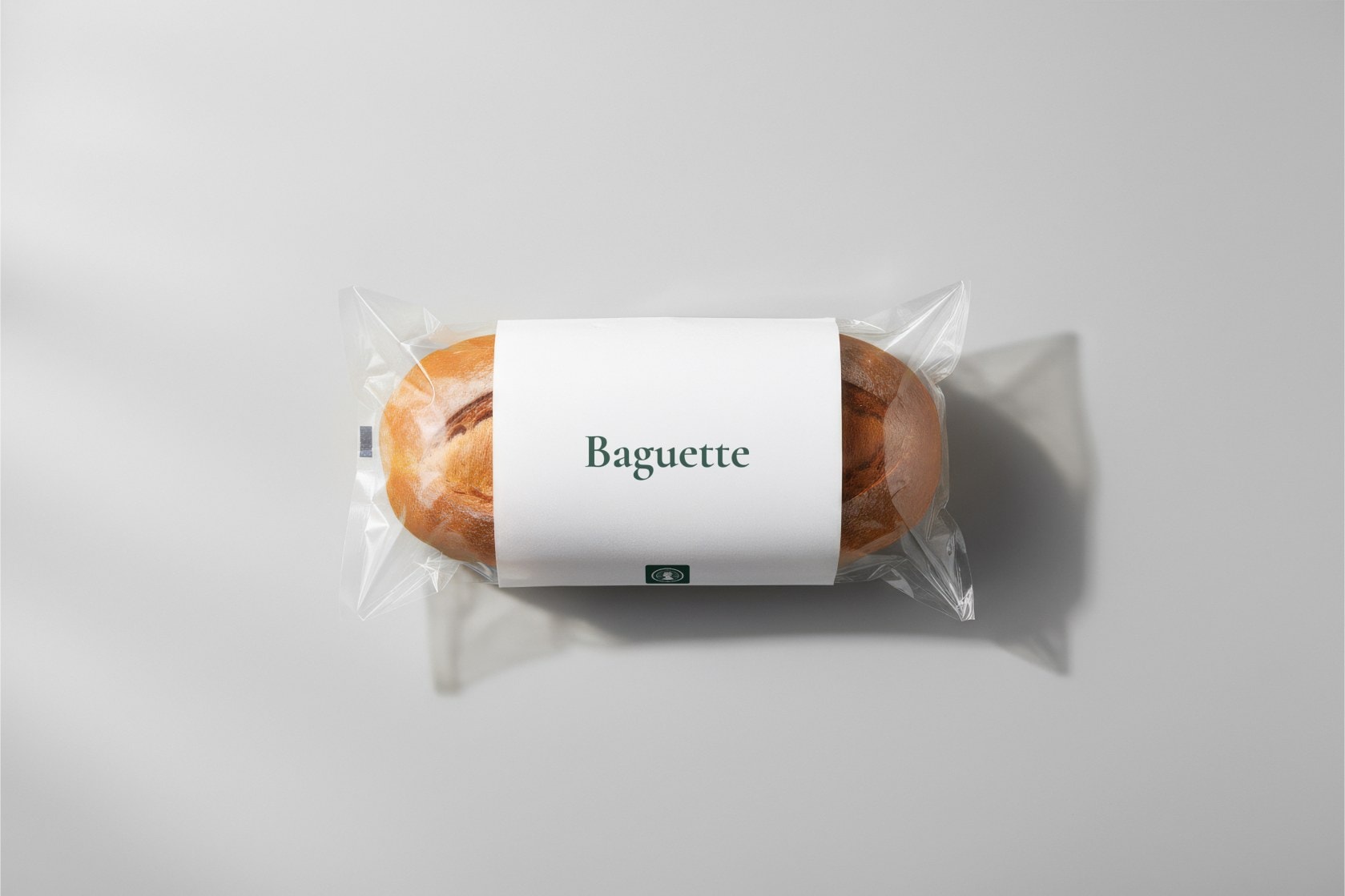 A baguette in branded wrapping