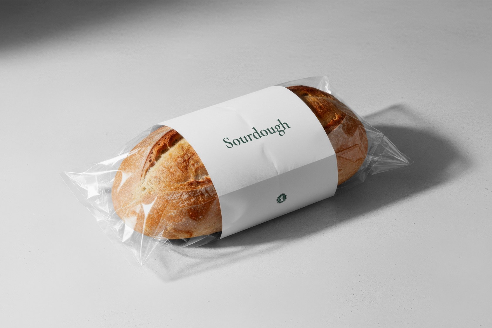 A sourdough loaf in branded wrapping