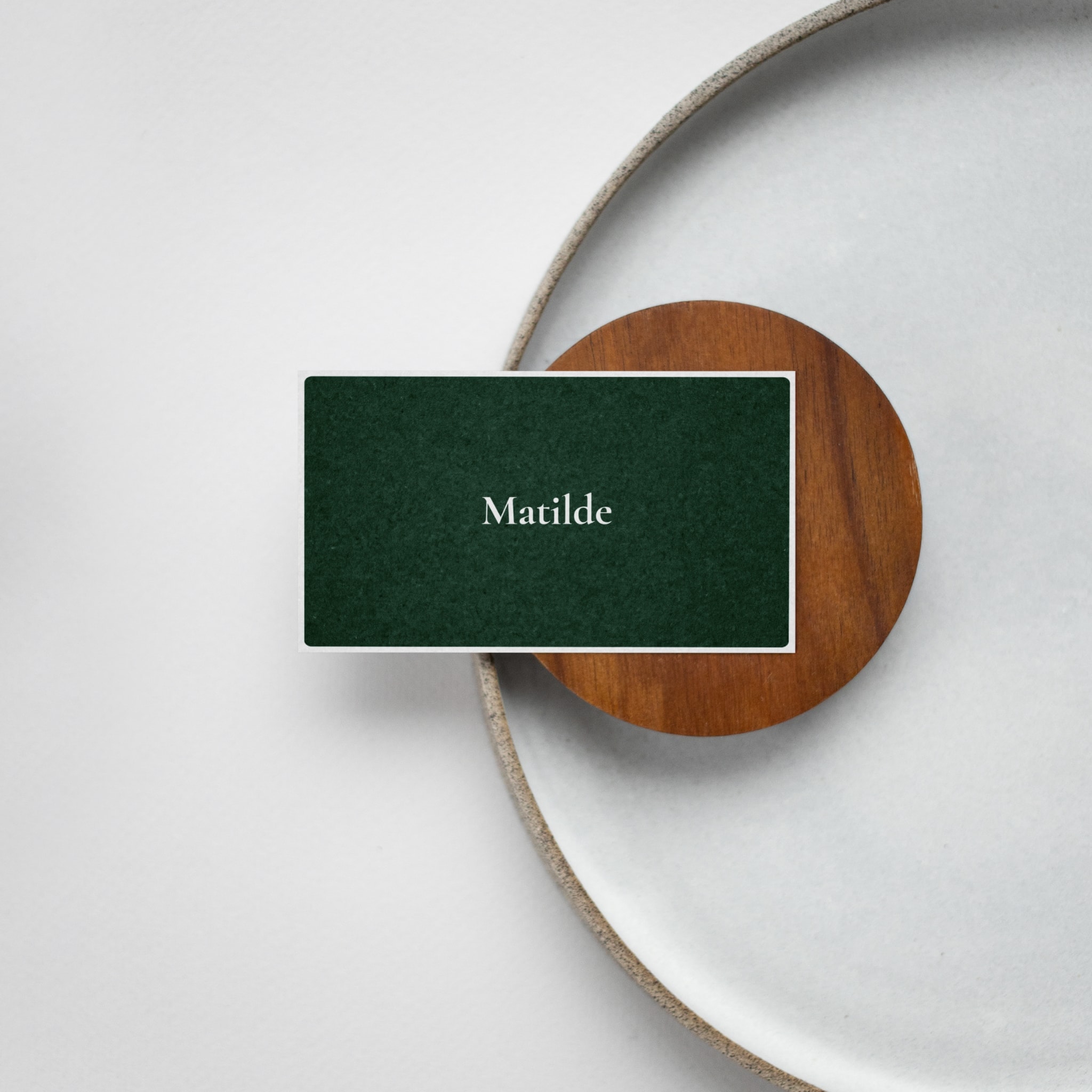 The business card on a wooden table