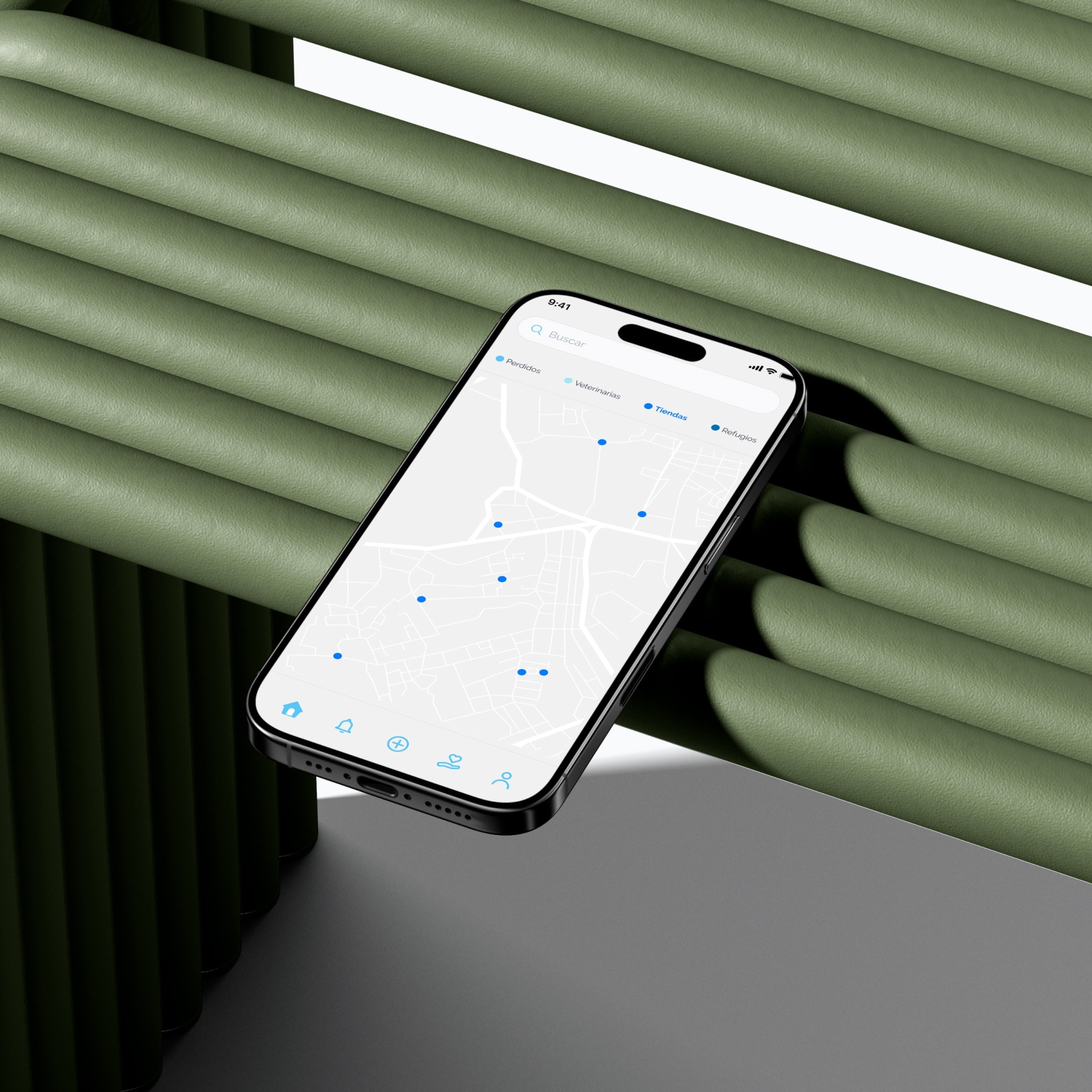 The Patitas app on a phone, resting on a bench
