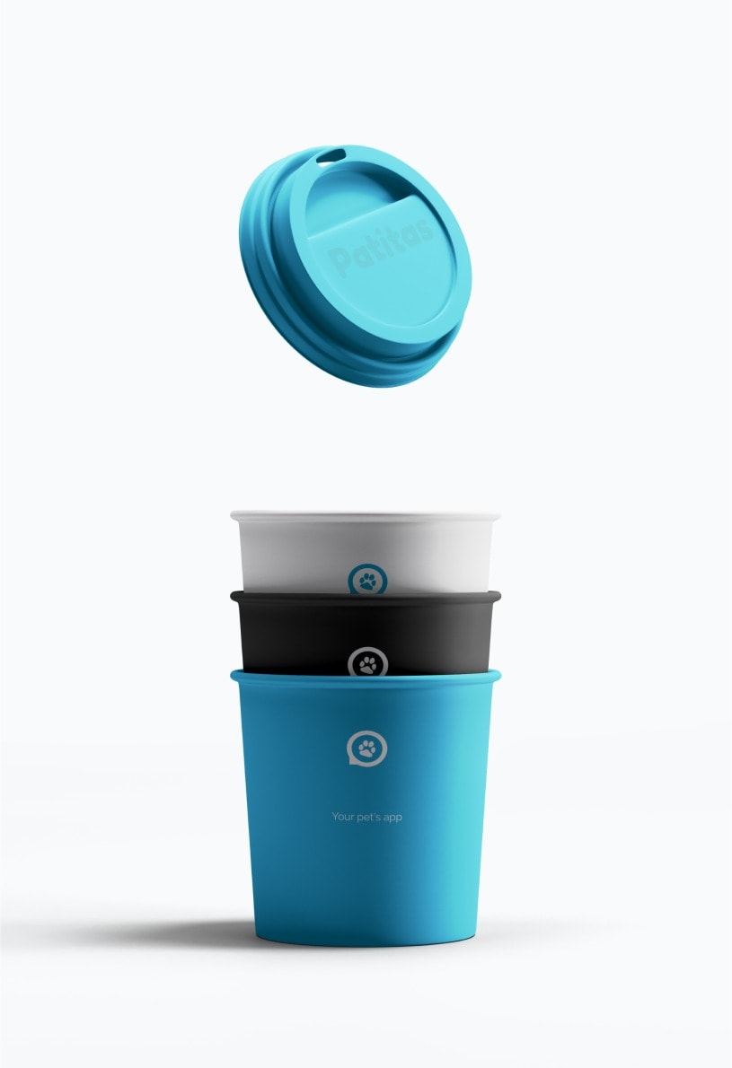 A branded coffee cup in the Patitas blue