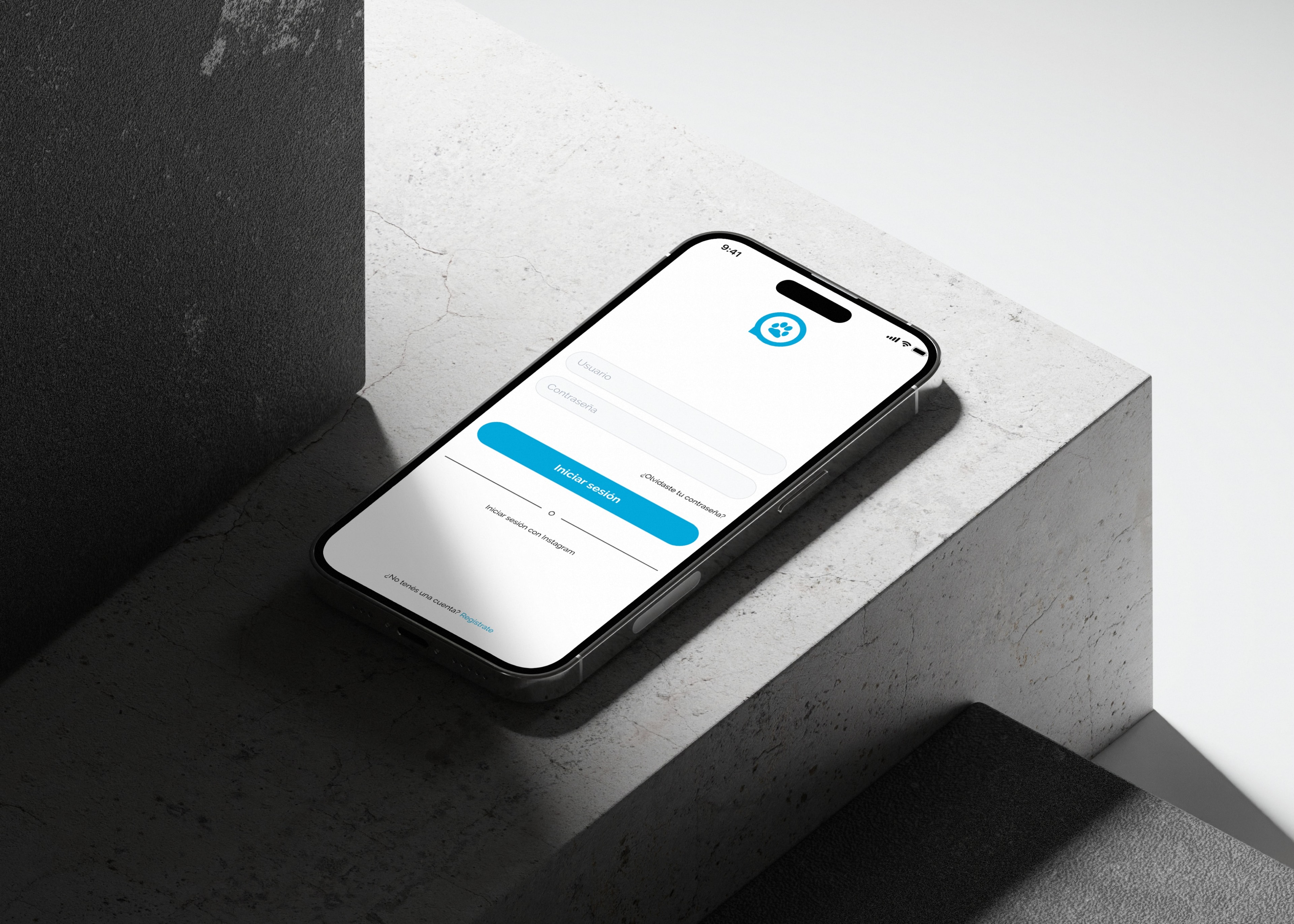 The sign-in screen of the app, on a phone over concrete